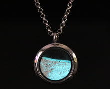 Glow in the Dark Cremation Necklace shown with glowing ashes