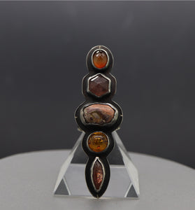 a group of three rings sitting on top of a table