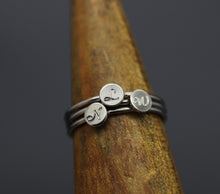 Simple Stacking Initial Rings