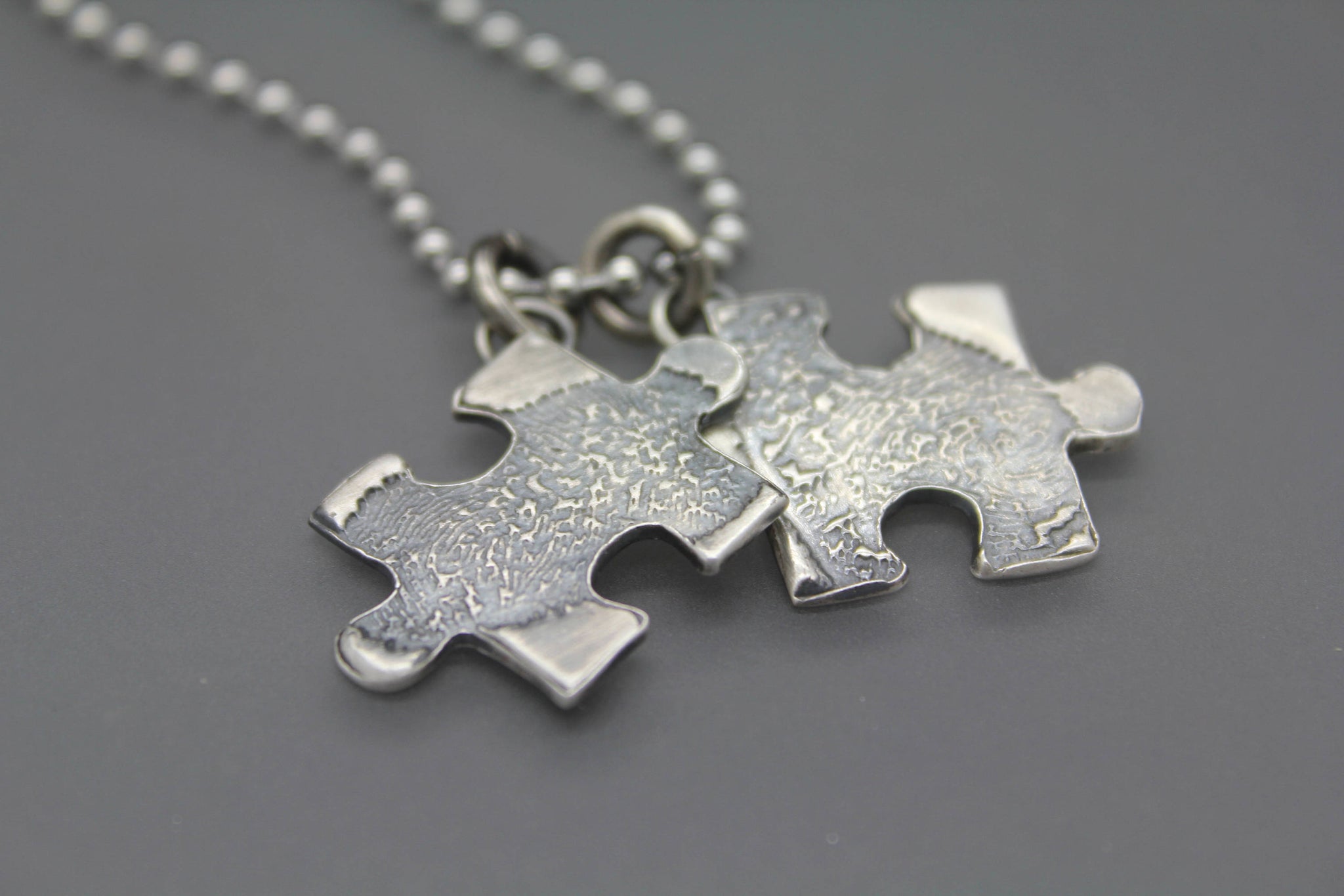 Silver necklace unisex puzzle